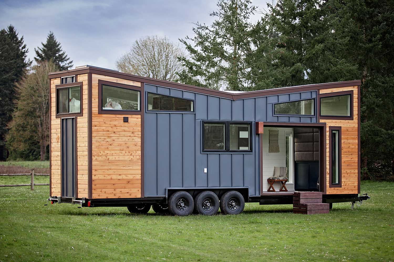 Outside shot of the unique shape of the Breezeway custom tiny home