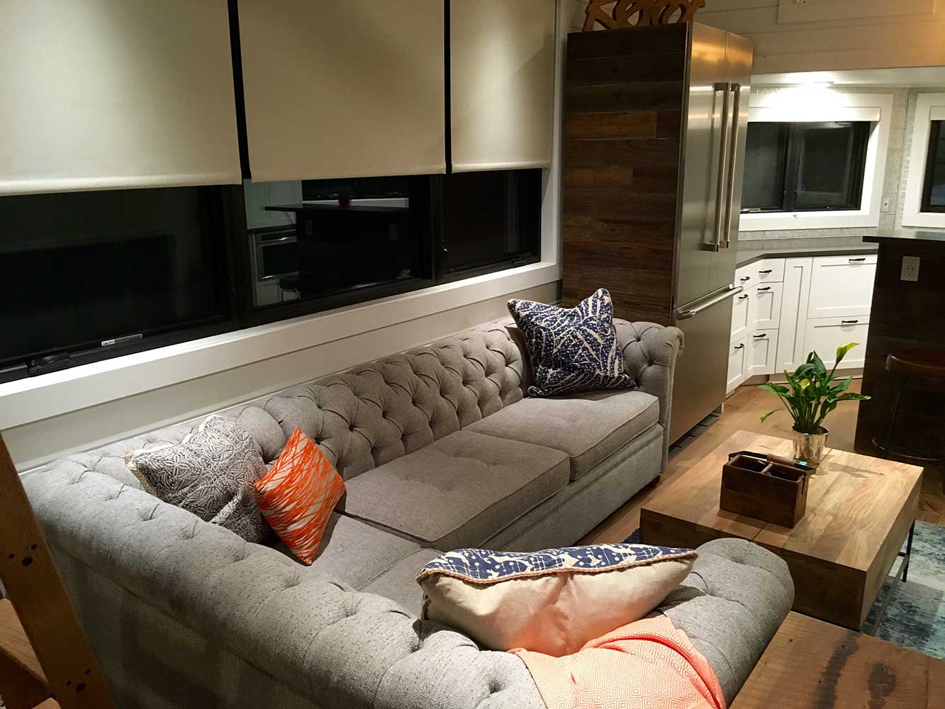 Long couch in the Hawaiian Retreat custom tiny home