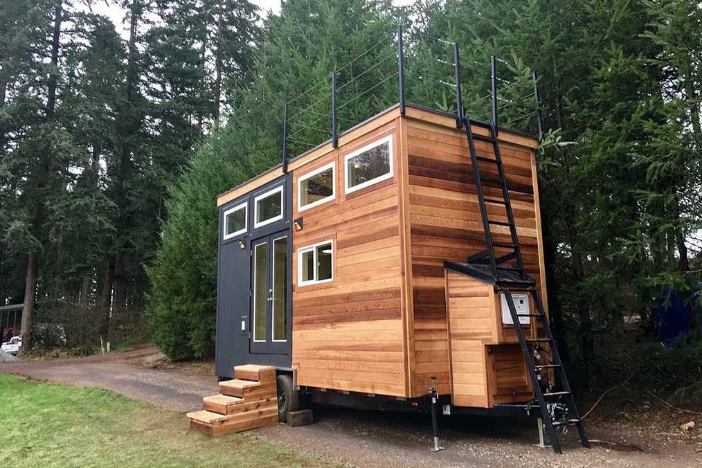 Beautiful wood siding on the Home Of Zen custom tiny house