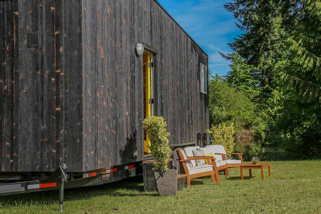 Outside of Modern Shou Sugi Ban custom tiny home